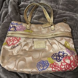 Gold coach purse